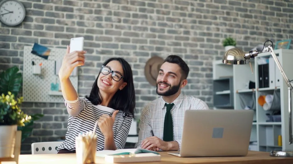 Group of business professionals collaborating in an office setting.